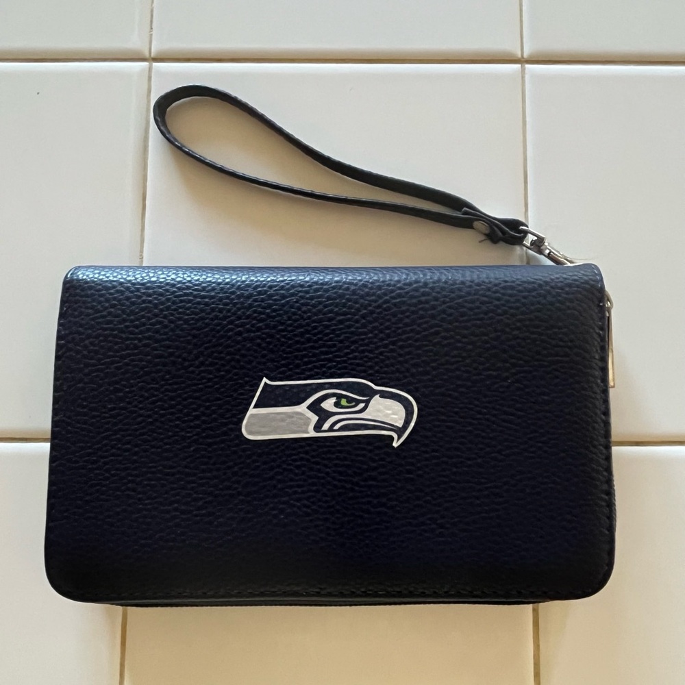 Seahawks wallet with zipper closure and detachable wrist strap
